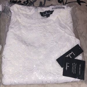 White dress. (One out of bag is the size I kept)